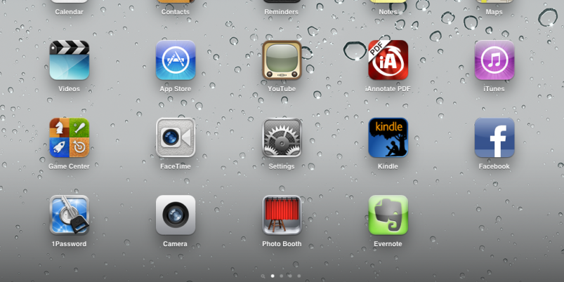 IPad home screen with app icons.