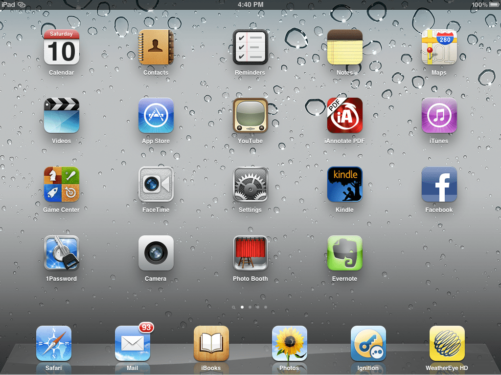 IPad home screen with app icons.